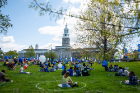 Masked guests were seated on the lawn in spray-painted circles spaced six feet apart. The circles and balloon markers were arranged by sophomore architecture students in the shape of an interlocking "UB."