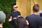Ed Steinfeld talks with students at a Habitat for Humanity house in Buffalo that was designed by UB students. Photo: Douglas Levere