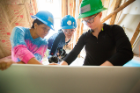 Architecture and planning students work on a Habitat for Humanity home on Buffalo's East Side. Photo: Douglas Levere