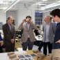 Diane Georgopulos, Richard Perlmutter and Franklin Dickinson, with Korydon Smith, UB professor and chair of architecture, visit our studios in Crosby Hall. 