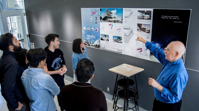 The 2017 NOMAS Competition team presenting their work for critique to one of our faculty advisors, Brian Carter,. 
