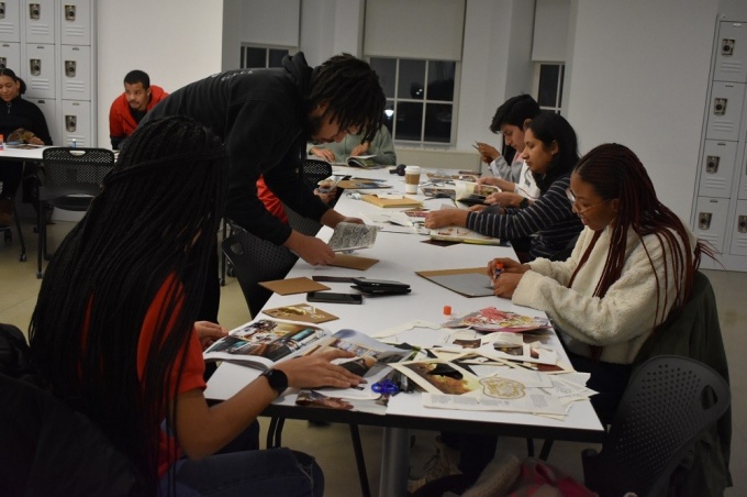 doubleASAP students working over a table. 