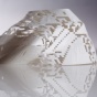 Mountain shaped 3d printed object with a pattern of orthogonal openings. 