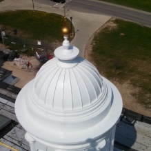Zoom image: Fully rebuilt to match the originals, the Hayes Hall cupolas are a beacon in the sun. 