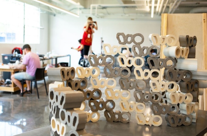 Designers work together on projects in the SMART Fabrication Factory in Parker Hall. 