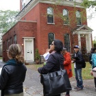 Graduate students in URP 529: Recording Place: Field Methods in Historic Preservation course exploring architectural styles in Buffalo’s historic Linwood neighborhood. 