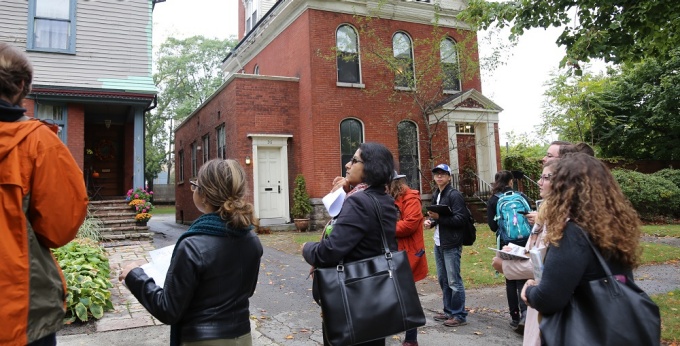 Graduate students in URP 529: Recording Place: Field Methods in Historic Preservation course exploring architectural styles in Buffalo’s historic Linwood neighborhood. 