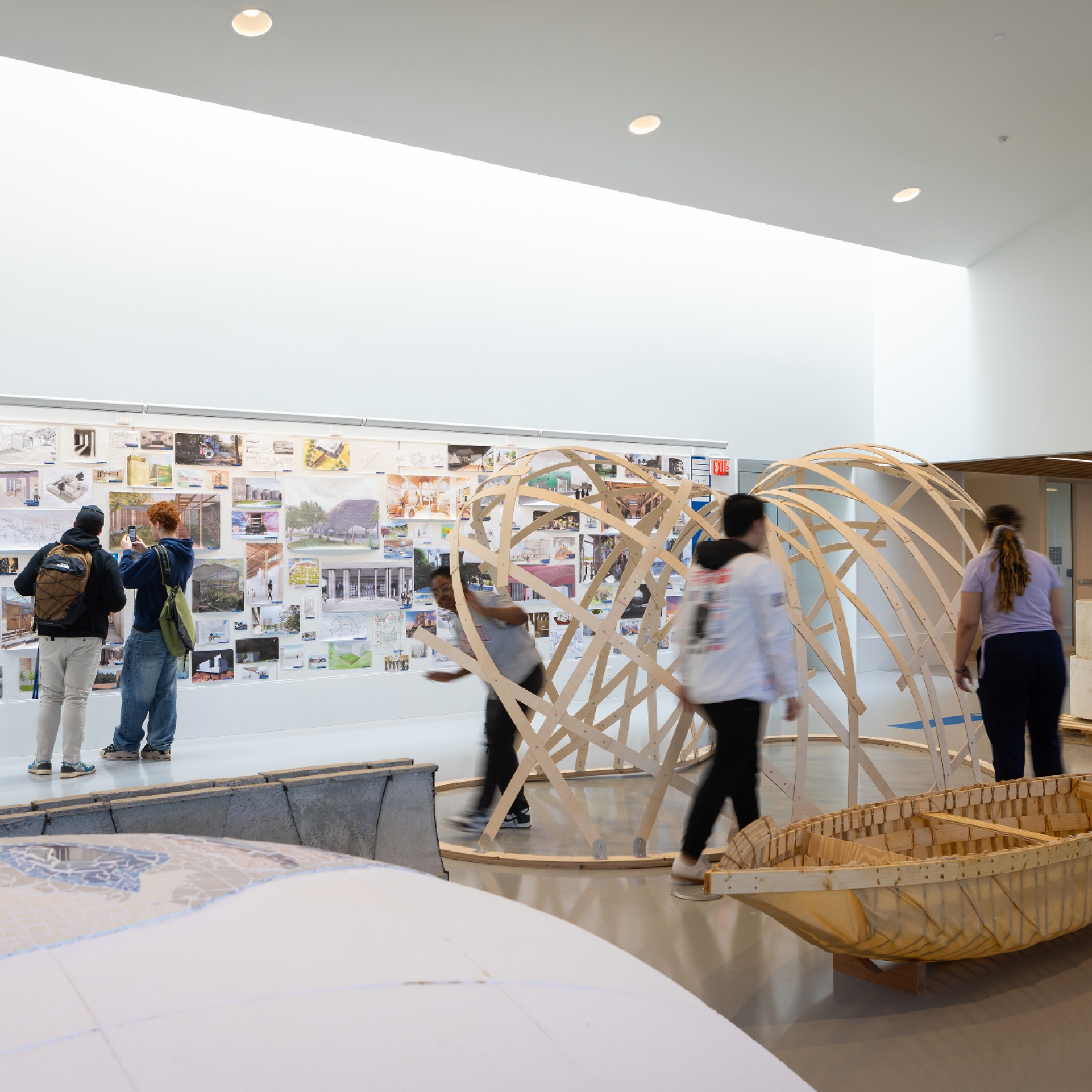 Students attending the Crosby Hall opening on the thrid floor exhibition space. 