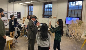 Dean Robert G. Shibley explores VR technology at our Situated Technologies graduate research studio open house on April 6. 