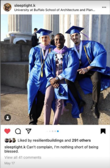 graduates pose with pride at Baird Point. 