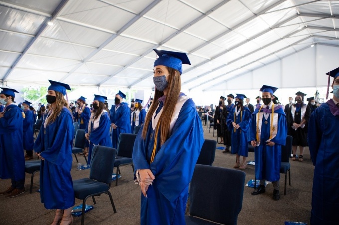 Graduates gathered under UB's Commencement Pavilion for the 49th Commencement of the School of Architecture and Planning. 