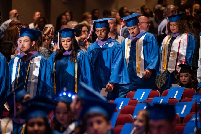 Graduates in the Architecture program walked down the aisle during the start of the ceremony that took place on May 19, 2023 in the CFA Mainstage Theater Photographer: Dylan Buyskes. 