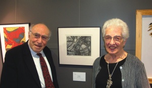 Zoom image: Harold L. Cohen and his wife, Mary, stand with Cohen’s “In Space” intaglio print at the recent Art Olympia exhibition in Tokyo. 