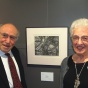 Zoom image: Harold L. Cohen and his wife, Mary, stand with Cohen’s “In Space” intaglio print at the recent Art Olympia exhibition in Tokyo. 