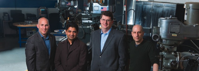 Zoom image: Co-leaders of SMART are Kemper Lewis, professor and chair of mechanical and aerospace engineering; Omar Khan, associate professor and chair of architecture; Kenneth English, deputy director of the Center for Engineering Design and Applied Simulation (CEDAS); and Michael Silver, assistant professor of architecture. © University at Buffalo, photo by Douglas Levere 