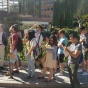 Photograph of students listening to Professor Miguel Guitart explain Madrid's architecture. 