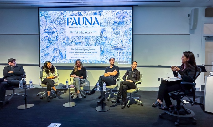 a panel of experts at a lecture in hayes hall. 
