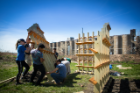 Most of the groups pre-fabricated the lumber for their structures in the School of Architecture and Planning's Fab Lab and then trucked the wood to Silo City, where the pieces could then be put together.