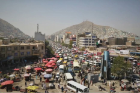 The informal economic system of Kabul includes more than 100,000 daily street vendors which clog the city's main thoroughfares.