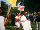 Continuation of protesters during the Flint Water Crisis. Image captured in the heat of summer, July 14, 2014. Photo courtesy of Ashley Nickels. 