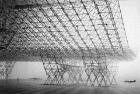 The U.S. Air Force Aircraft Hanger proposed by Konrad Wachsmann in 1951 presents the full capacity of his proposal for a coordinated joint-based construction system. Image from https://www.atlasofplaces.com/architecture/usaf-aircraft-hangar/