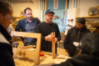SACRA's lead instructor is Dennis Maher (center, left), a clinical assistant professor of architecture at the University at Buffalo. A rotating cast of craftspeople, including Jim Cordes (next to Maher), woodworking artist-in-residence at the Roycroft Campus in East Aurora, N.Y., offer demonstrations to the class. Photo: Douglas Levere