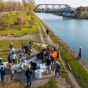 Zoom image: UB architecture students and faculty work on the installation of the Sydney Gross Memorial along the Erie Canal in Medina, N.Y., on Nov. 13. Photo: Douglas Levere 